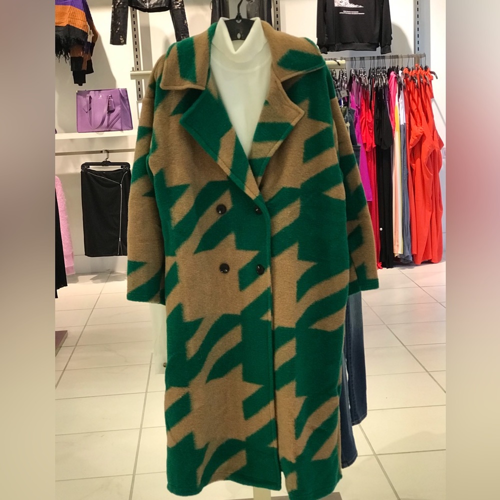 SOLD.Long wool coat . Not super heavy. Brand New in Boutique.